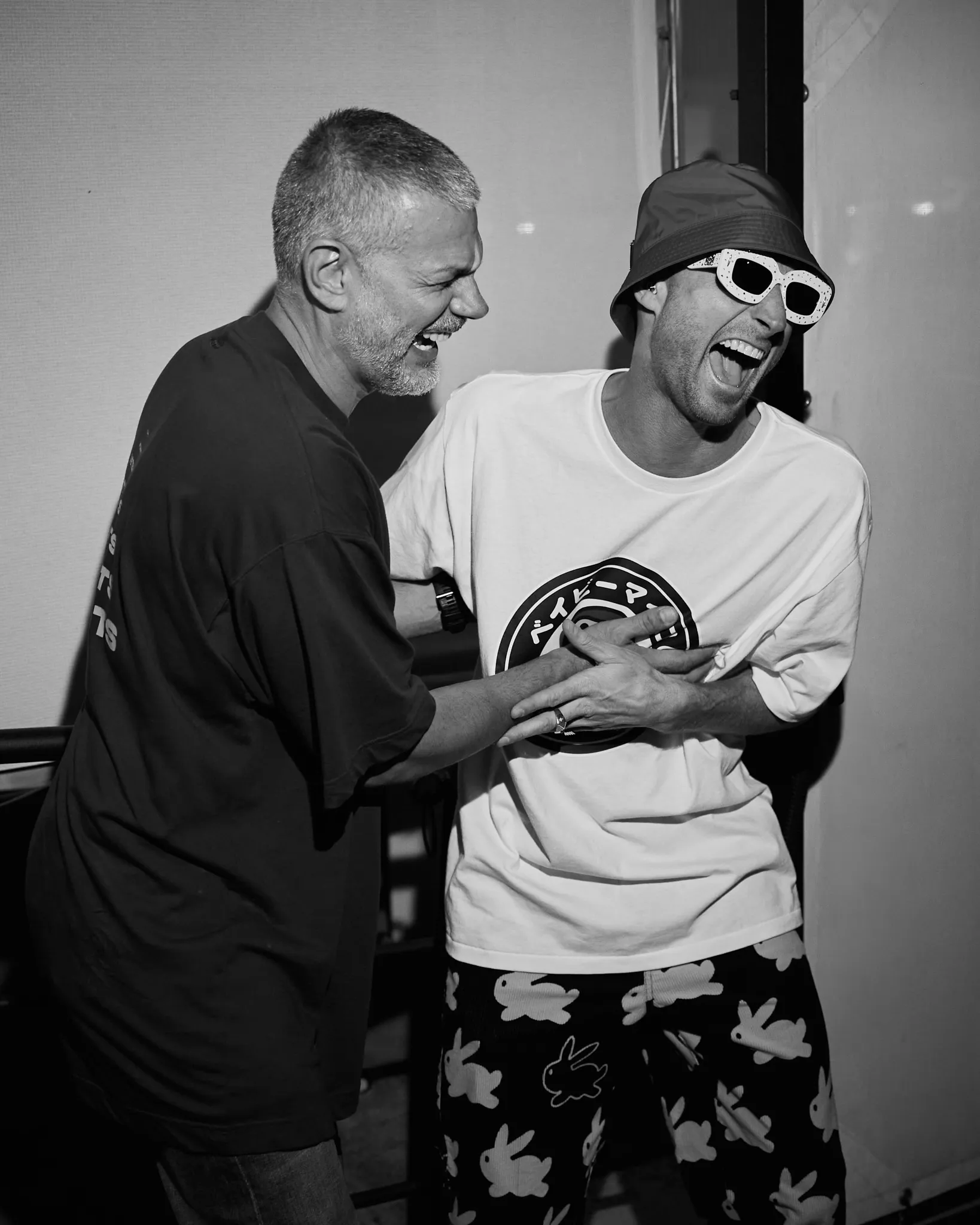 Yann Pissenem and FISHER laughing backstage at Hï Ibiza